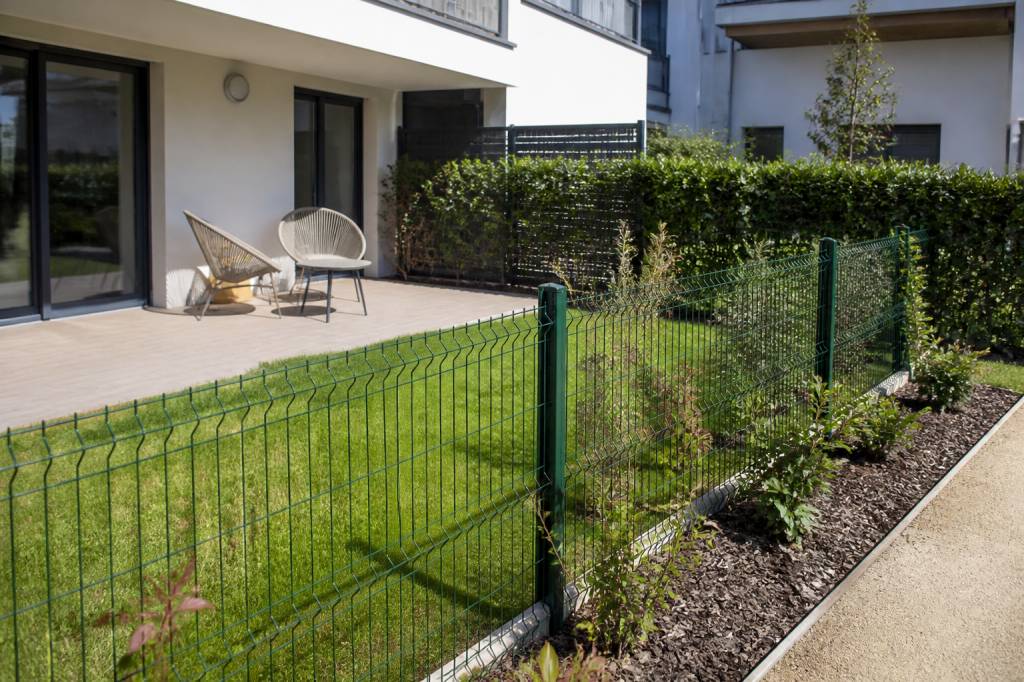 Clôture jardin privatif copropriété : règles, autorisations et entretien