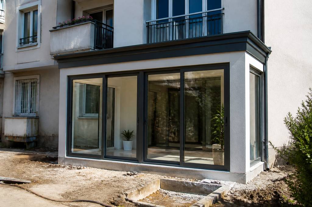 Agrandir sans permis de construire : règles et démarches à connaître en copropriété